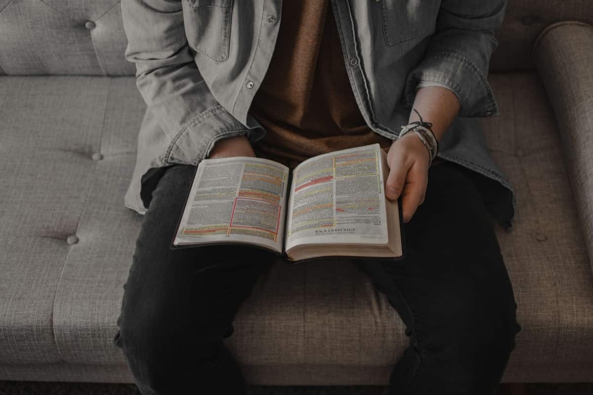 A ministry leader studying highlighted notes while planning digital outreach